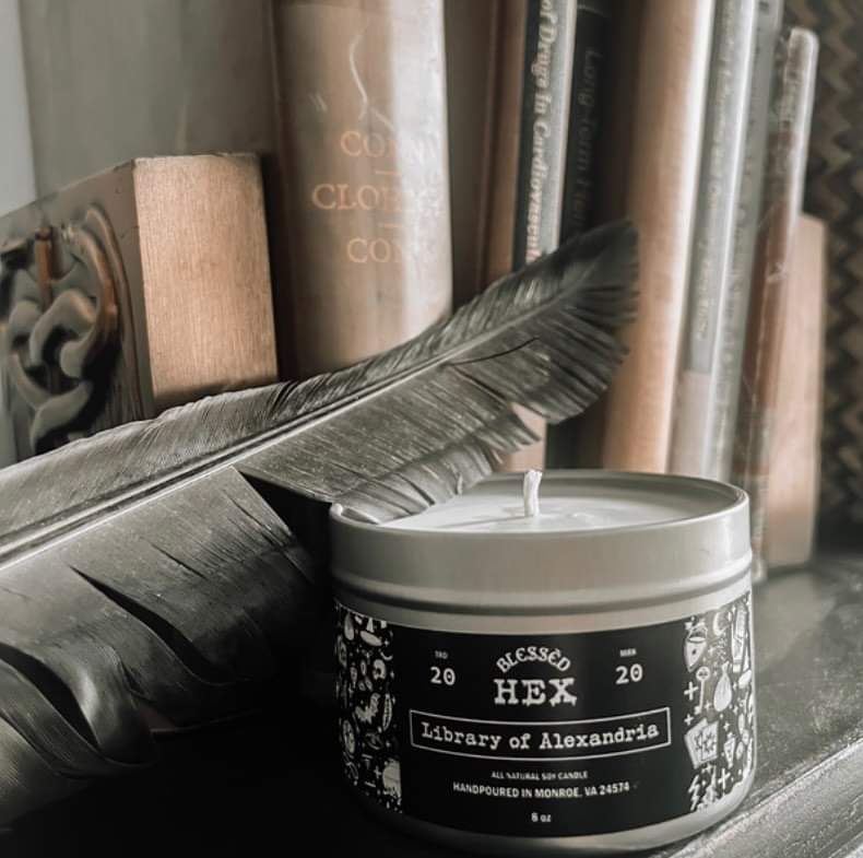 Library of Alexandria luxury soy candle in a recyclable tin, a leather and nag champa fragrance from Blessèd Hex