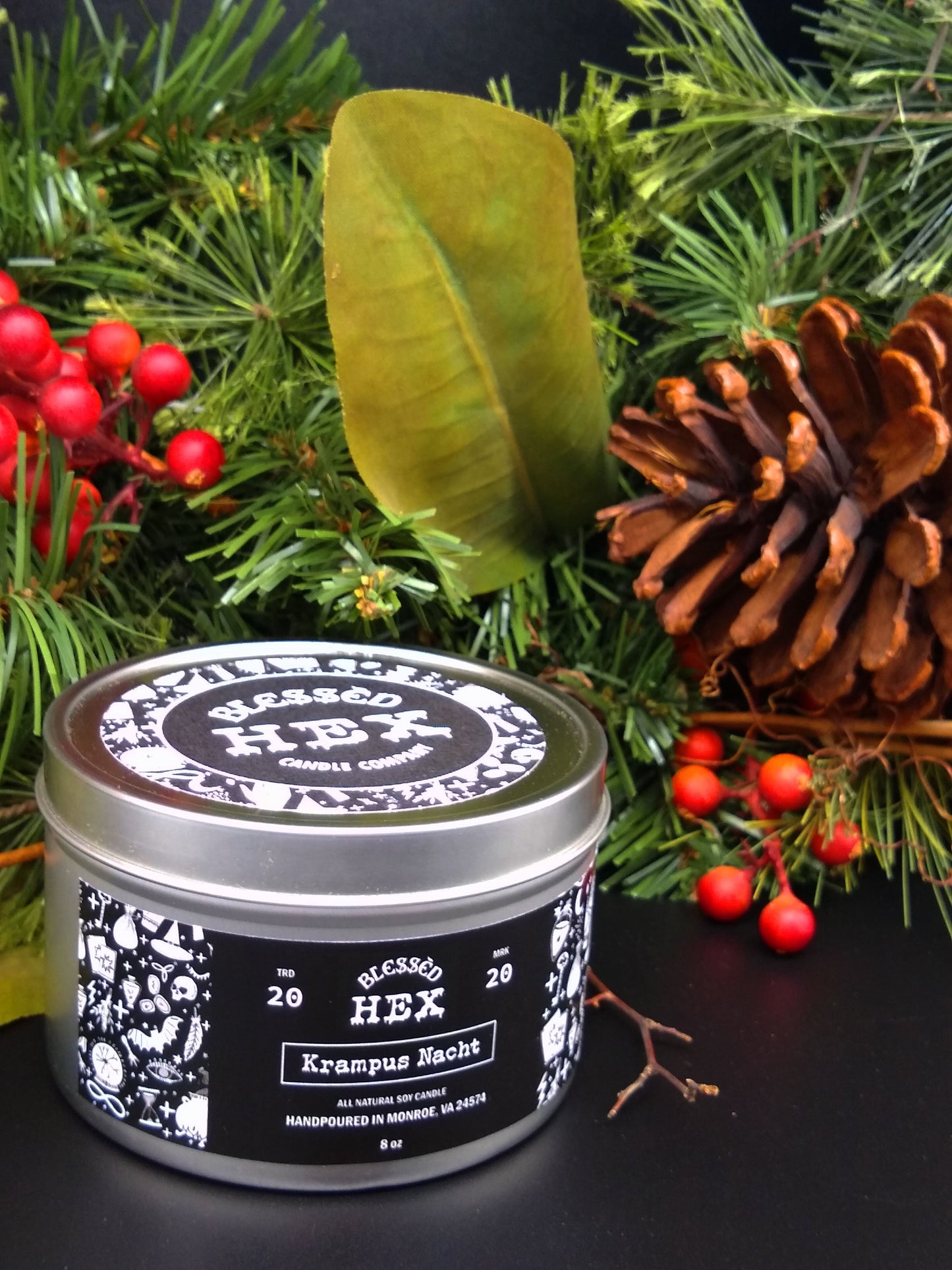 Krampus Nacht luxury soy candle in a recyclable tin, a woody spiced holiday horror fragrance from Blessèd Hex